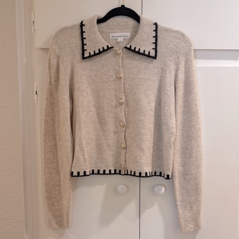 Threaded Leaf Boutique Beige Cardigan with Black Trim and Gold Buttons